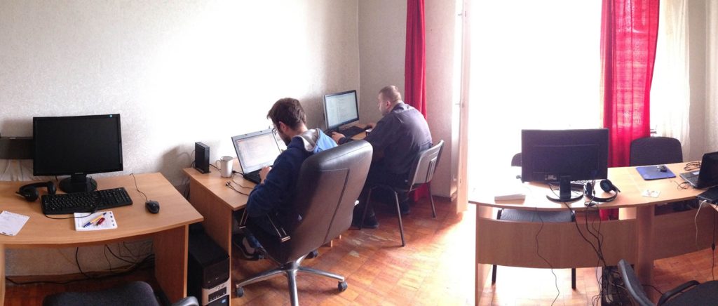 Sombra’s first office with two engineers working at desks during the company’s early startup phase.