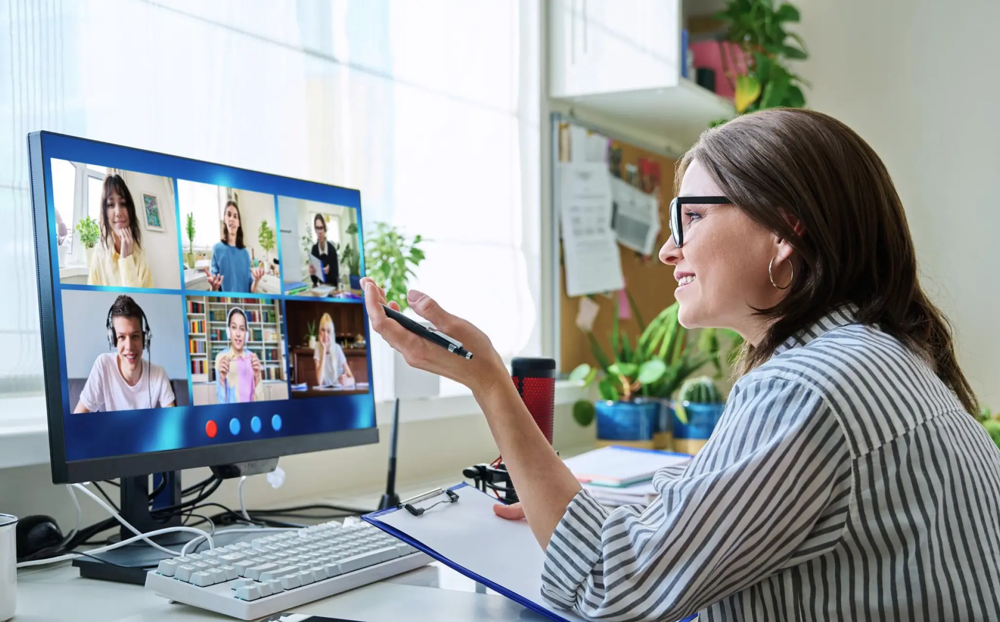 A woman having a video conference in an office